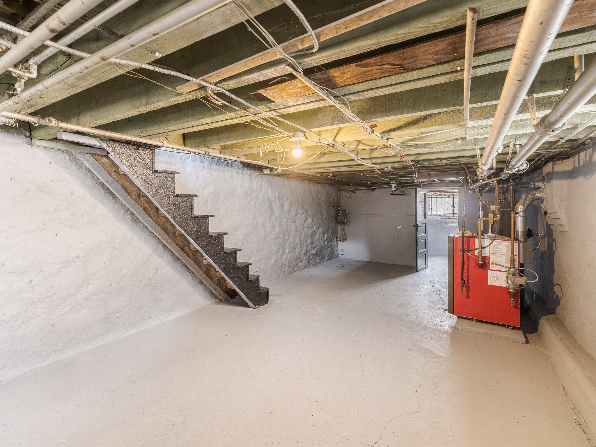 1823 South Yewdall Street Philadelphia, PA 19143 - Photo 21 of 21 Basement with storage potential.