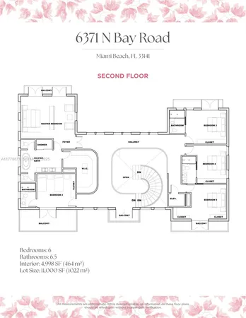 an aerial view of a house with yard and outdoor seating