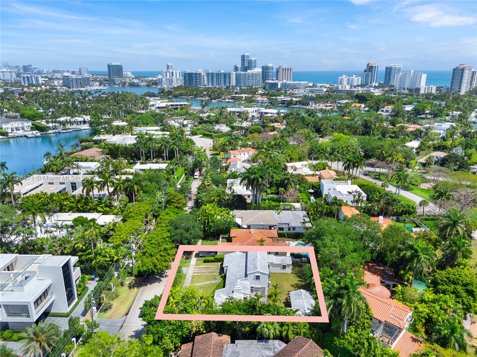 6371 North Bay Road Miami Beach, FL 33141 - Photo 24 of 26 an aerial view of a city with lots of residential buildings