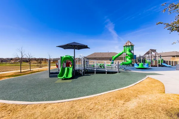 a view of a park with a slide