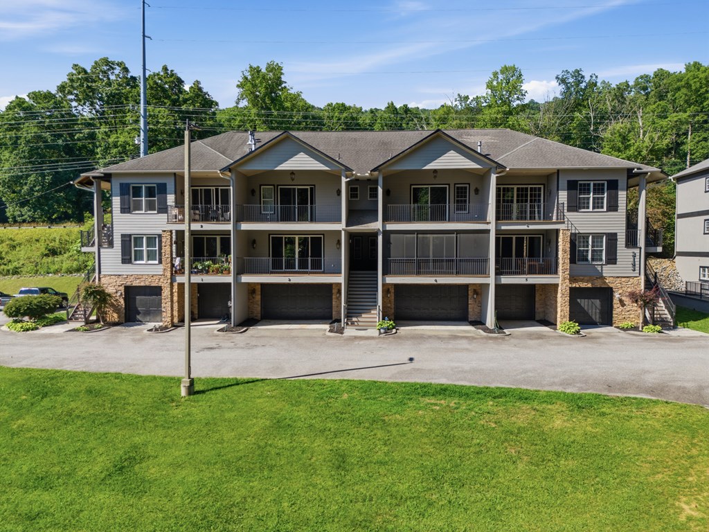 2143 Ridgecrest Circle, Unit 1 Hiawassee, GA 30546 - Photo 51 of 53 front view of a house with a yard