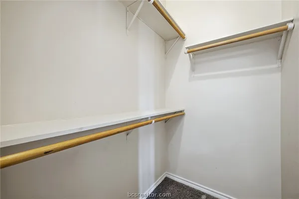 a view of a room with racks on the wall