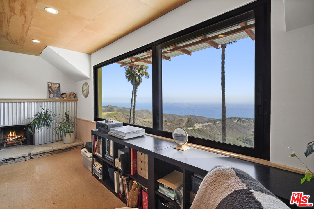 26335 Lockwood Road Malibu, CA 90265 - Photo 22 of 39 a very nice looking room with a large window
