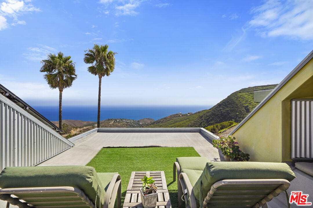 26335 Lockwood Road Malibu, CA 90265 - Photo 26 of 39 a view of a balcony with ocean view