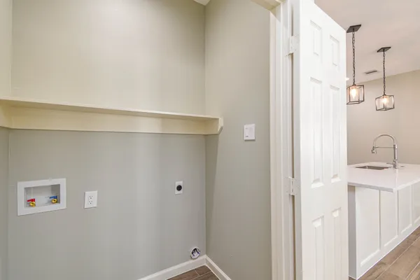 a bathroom with a sink and shower