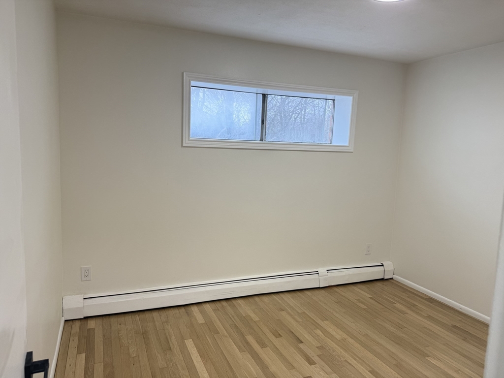 115 Grove Street, Unit 1 Boston, MA 02132 - Photo 11 of 15 a view of a small space