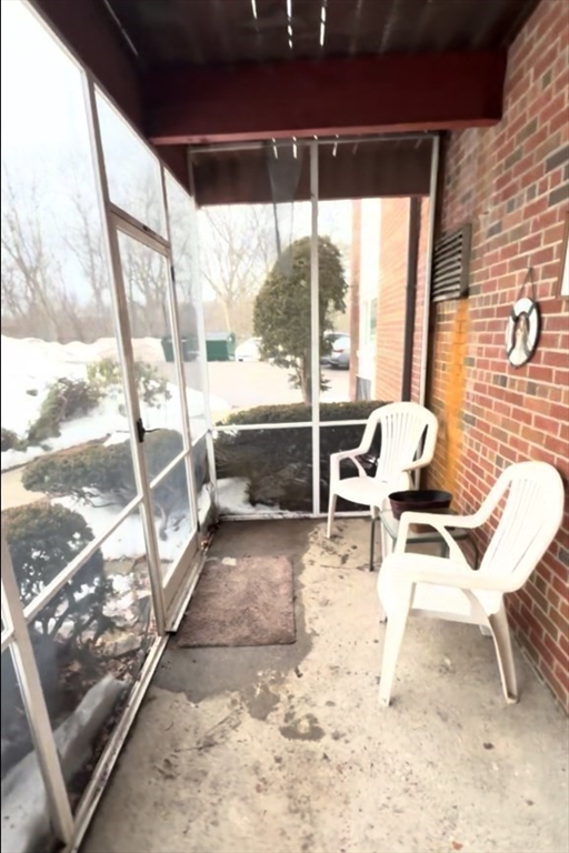 115 Grove Street, Unit 1 Boston, MA 02132 - Photo 13 of 15 a living room with a large window
