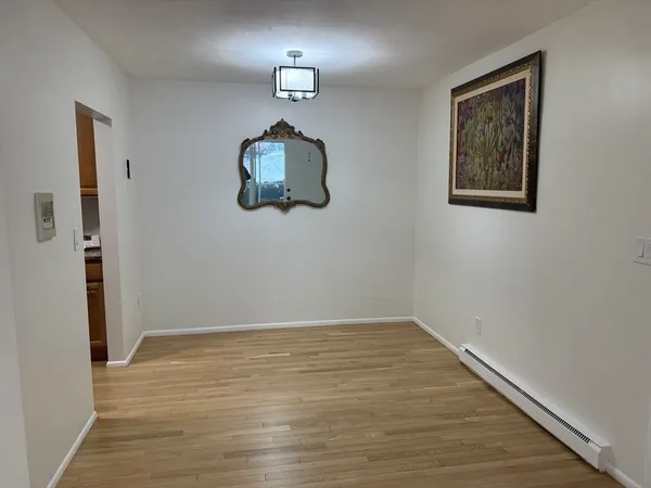 $395,000 | 115 Grove Street, Unit 1, Boston, MA 02132