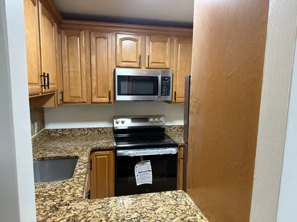 $395,000 | 115 Grove Street, Unit 1, Boston, MA 02132