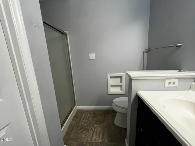 a bathroom with a sink and toilet
