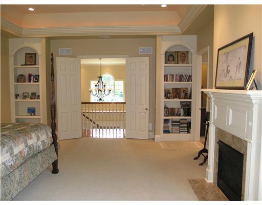 920 Settlers Ridge Road Fox Chapel, PA 15238 - Photo 14 of 18 Master Bedroom. Reverse view of the master bedroom shows twin built-in bookcases and double-door entry.