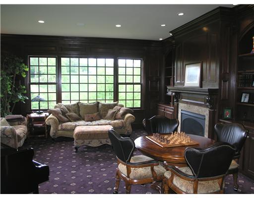 920 Settlers Ridge Road Fox Chapel, PA 15238 - Photo 4 of 18 Living Room. The stately living room showcases a marble fireplace flanked by built-in cherry bookcases and huge windows.