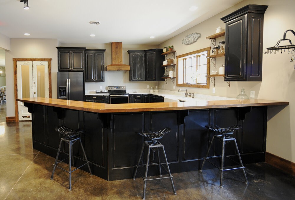 3795 Turnersville Road Cedar Hill, TN 37032 - Photo 11 of 22 a kitchen with stainless steel appliances a sink and cabinets