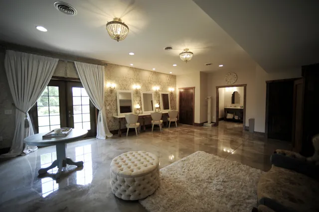 a lobby with furniture and a large window