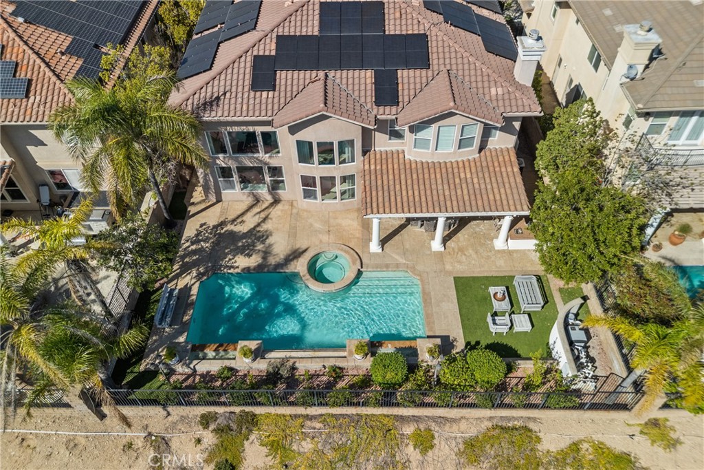 20366 Vía Galileo Porter Ranch, CA 91326 - Photo 12 of 75 an aerial view of a house with a yard and potted plants