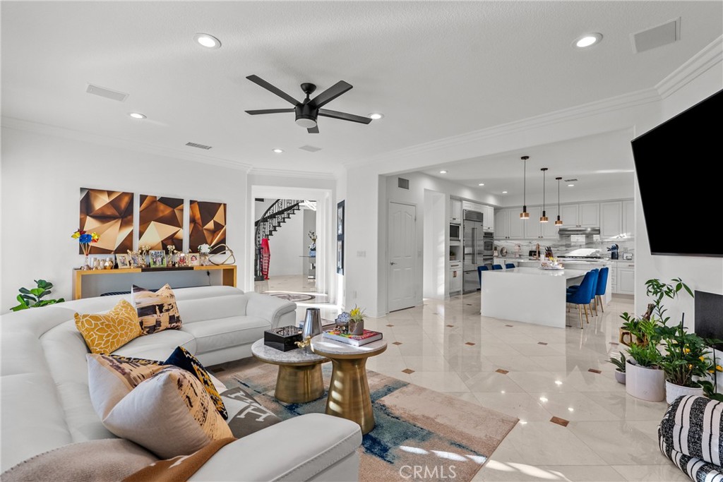 20366 Vía Galileo Porter Ranch, CA 91326 - Photo 31 of 75 a living room with furniture and a flat screen tv