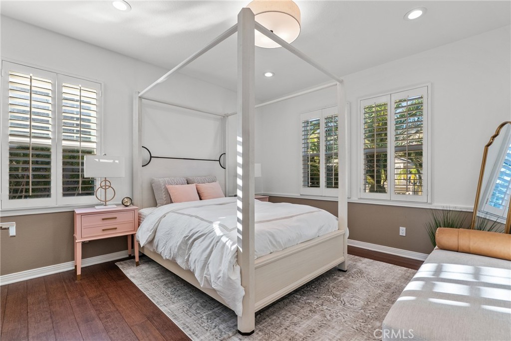 20366 Vía Galileo Porter Ranch, CA 91326 - Photo 52 of 75 a bed room with a bed and a chair