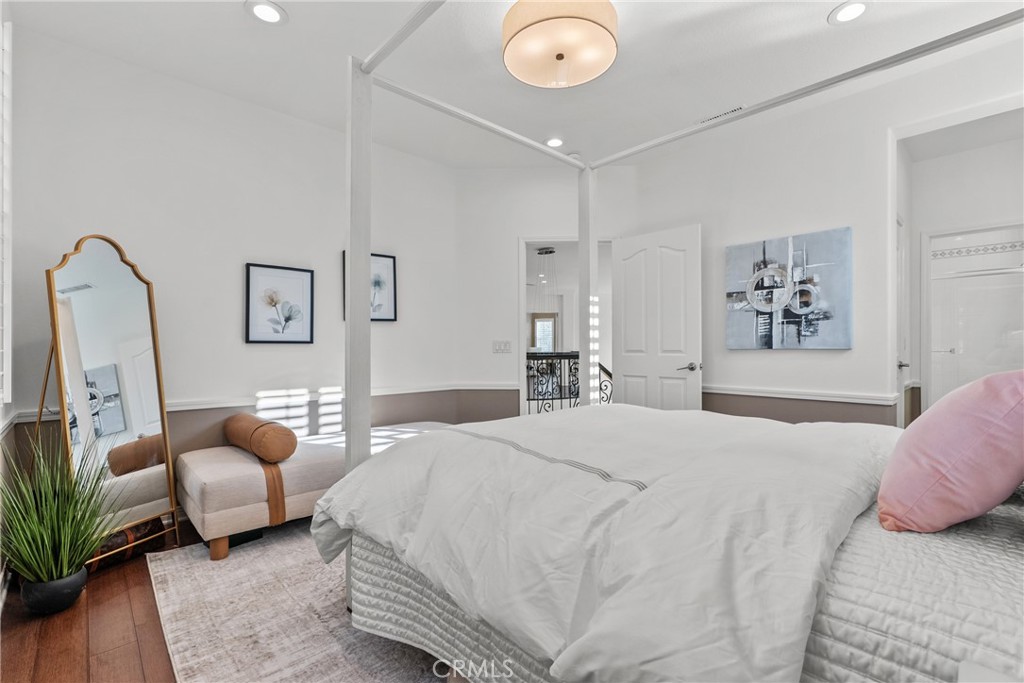 20366 Vía Galileo Porter Ranch, CA 91326 - Photo 53 of 75 a bedroom with a bed and furniture