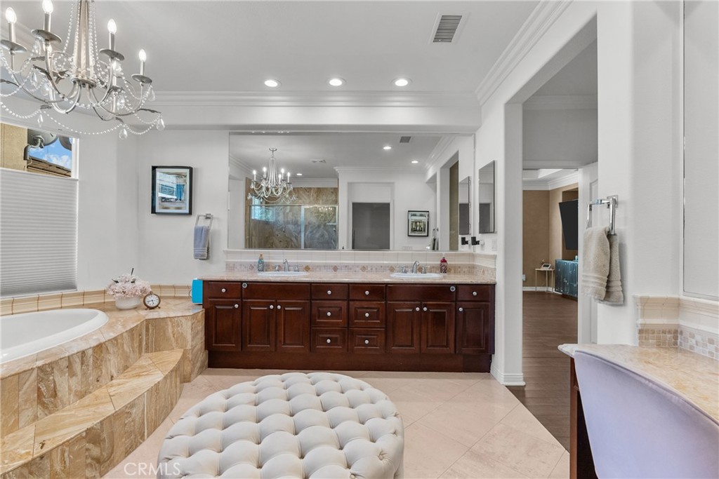 20366 Vía Galileo Porter Ranch, CA 91326 - Photo 70 of 75 a large bathroom with a sink a large mirror and a bathtub