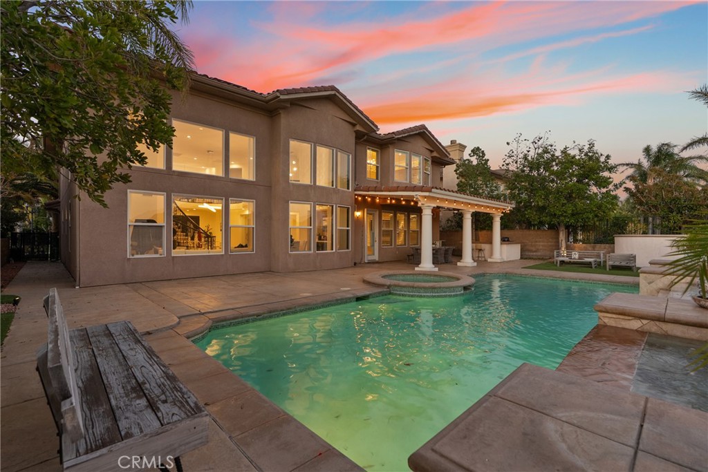 20366 Vía Galileo Porter Ranch, CA 91326 - Photo 7 of 75 a front view of a house with a yard