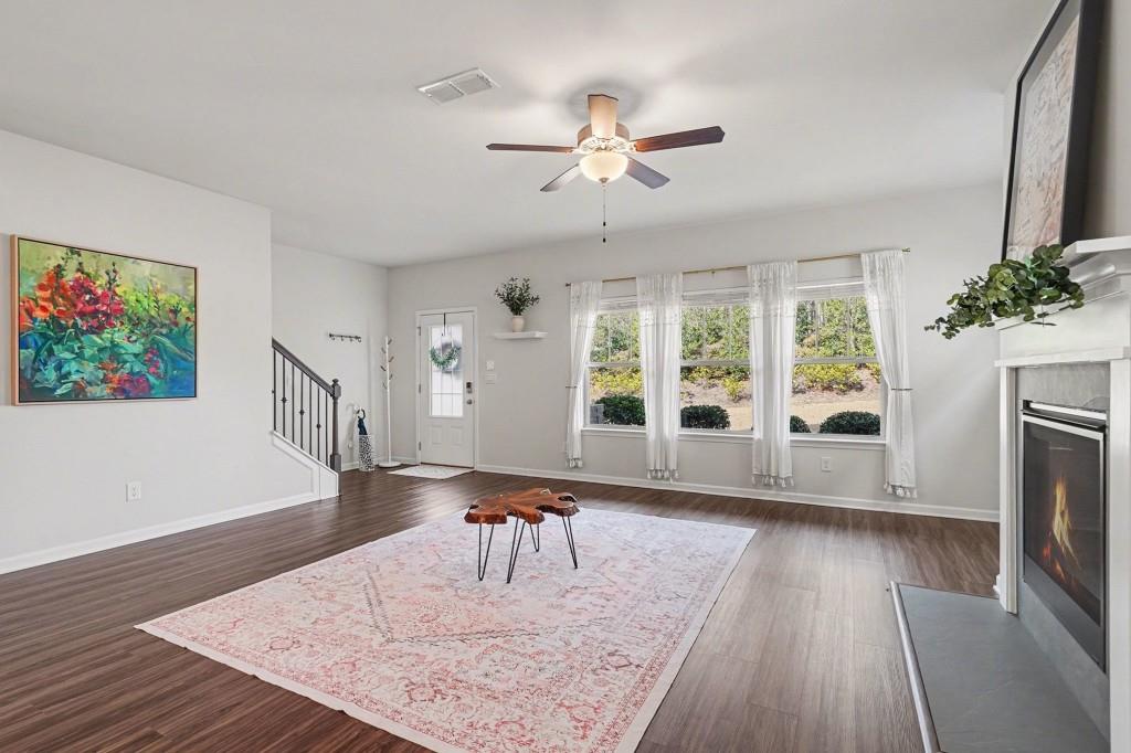 4740 Electric Avenue Southwest Mableton, GA 30126 - Photo 17 of 51 a living room with furniture and a fireplace
