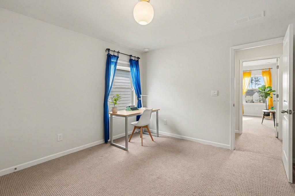 4740 Electric Avenue Southwest Mableton, GA 30126 - Photo 29 of 51 a view of a livingroom with furniture and a window