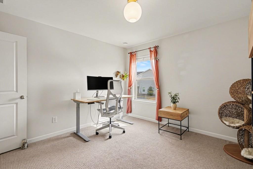4740 Electric Avenue Southwest Mableton, GA 30126 - Photo 33 of 51 a view of a livingroom with workspace and a window
