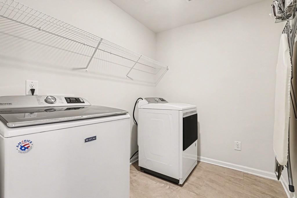 4740 Electric Avenue Southwest Mableton, GA 30126 - Photo 36 of 51 a utility room with dryer and washer