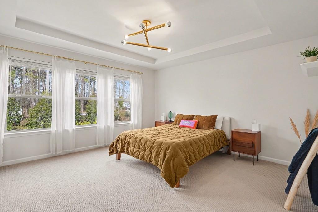 4740 Electric Avenue Southwest Mableton, GA 30126 - Photo 4 of 51 a bed room with a bed and a chair