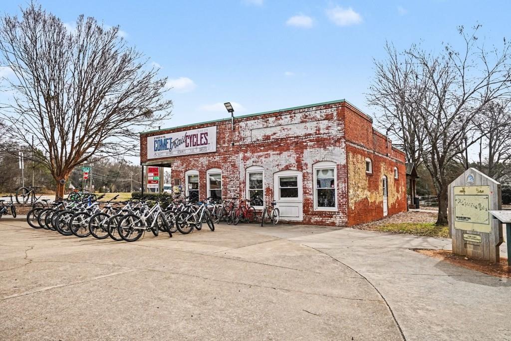4740 Electric Avenue Southwest Mableton, GA 30126 - Photo 45 of 51 a view of a building with a yard covered with snow in the outdoor space