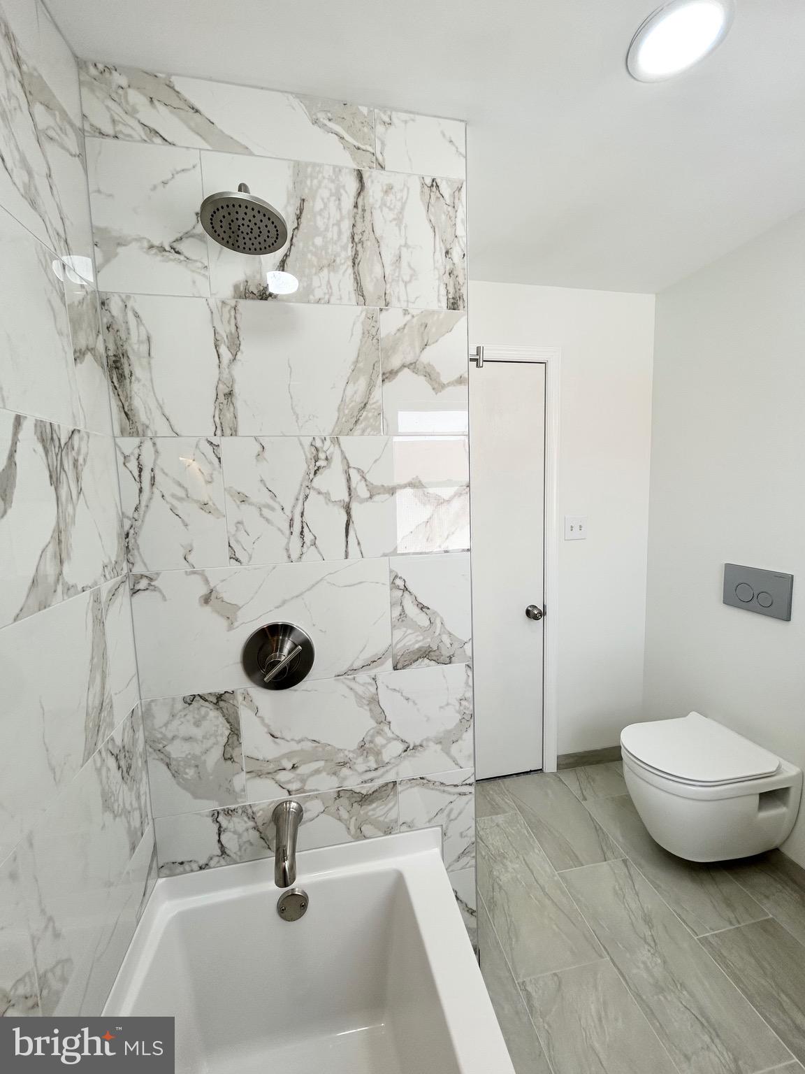 1007 Ripley Street Philadelphia, PA 19111 - Photo 28 of 39 a bathroom with a sink and a toilet