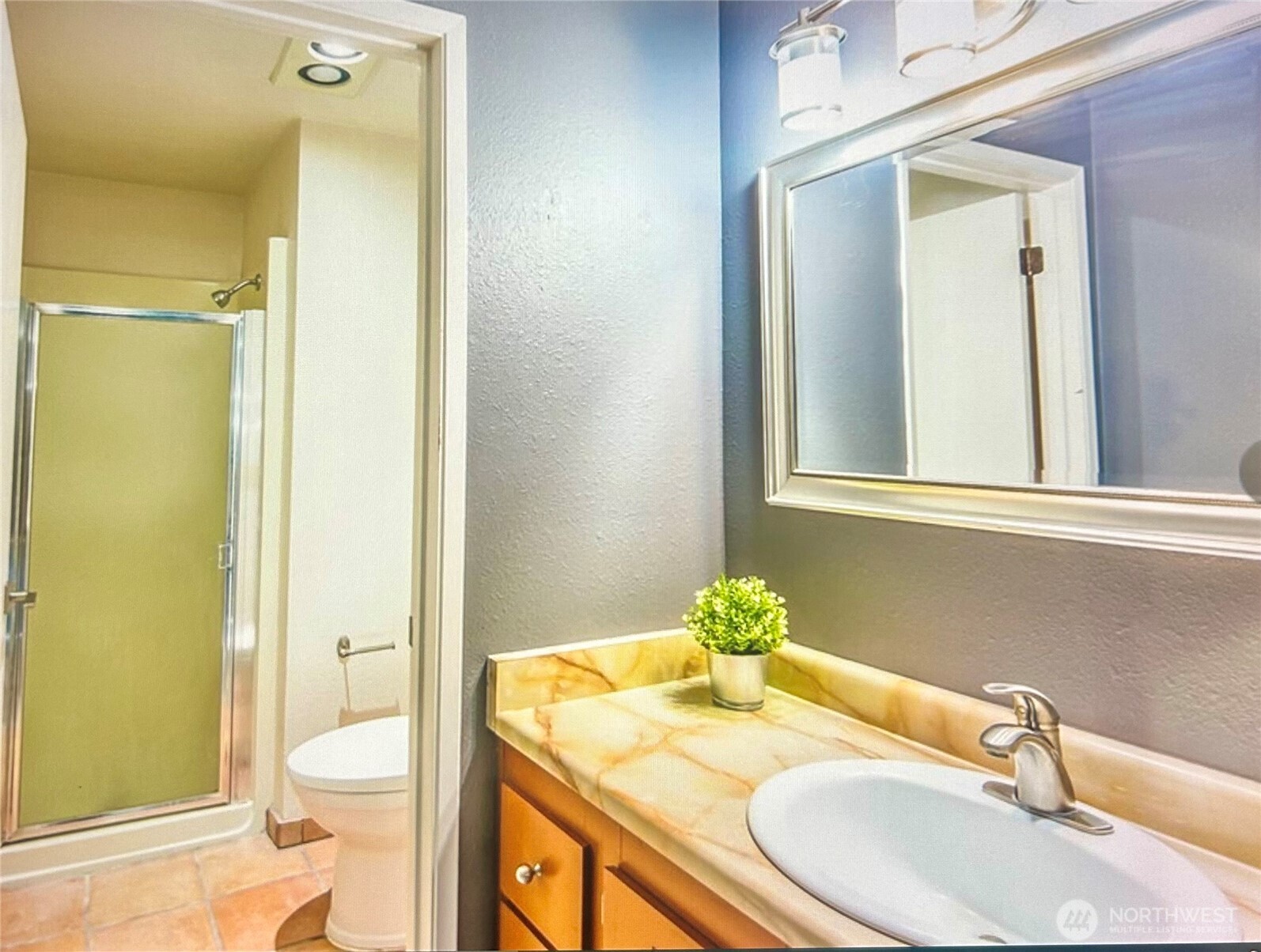 2020 Southwest 318th Place, Unit C3 Federal Way, WA 98023 - Photo 14 of 22 a bathroom with a granite countertop sink toilet and shower