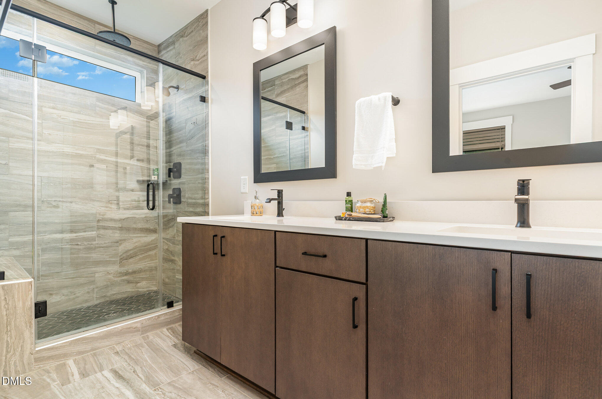 4016 Emerald Green Road Raleigh, NC 27612 - Photo 10 of 22 a bathroom with a double vanity sink mirror and shower