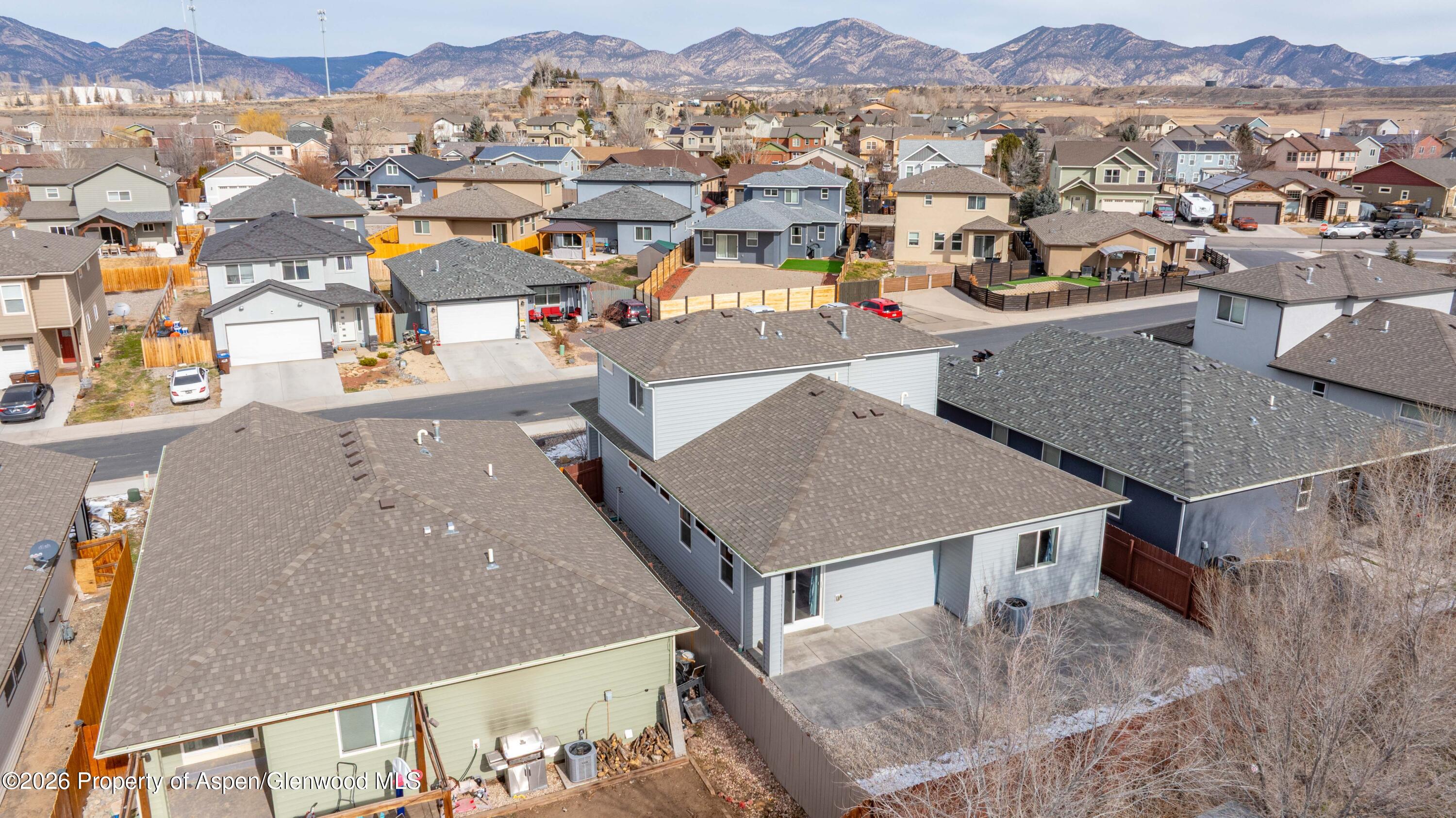 1671 East 17th Circle Rifle, CO 81650 - Photo 20 of 25 an aerial view of a house with a mountain view