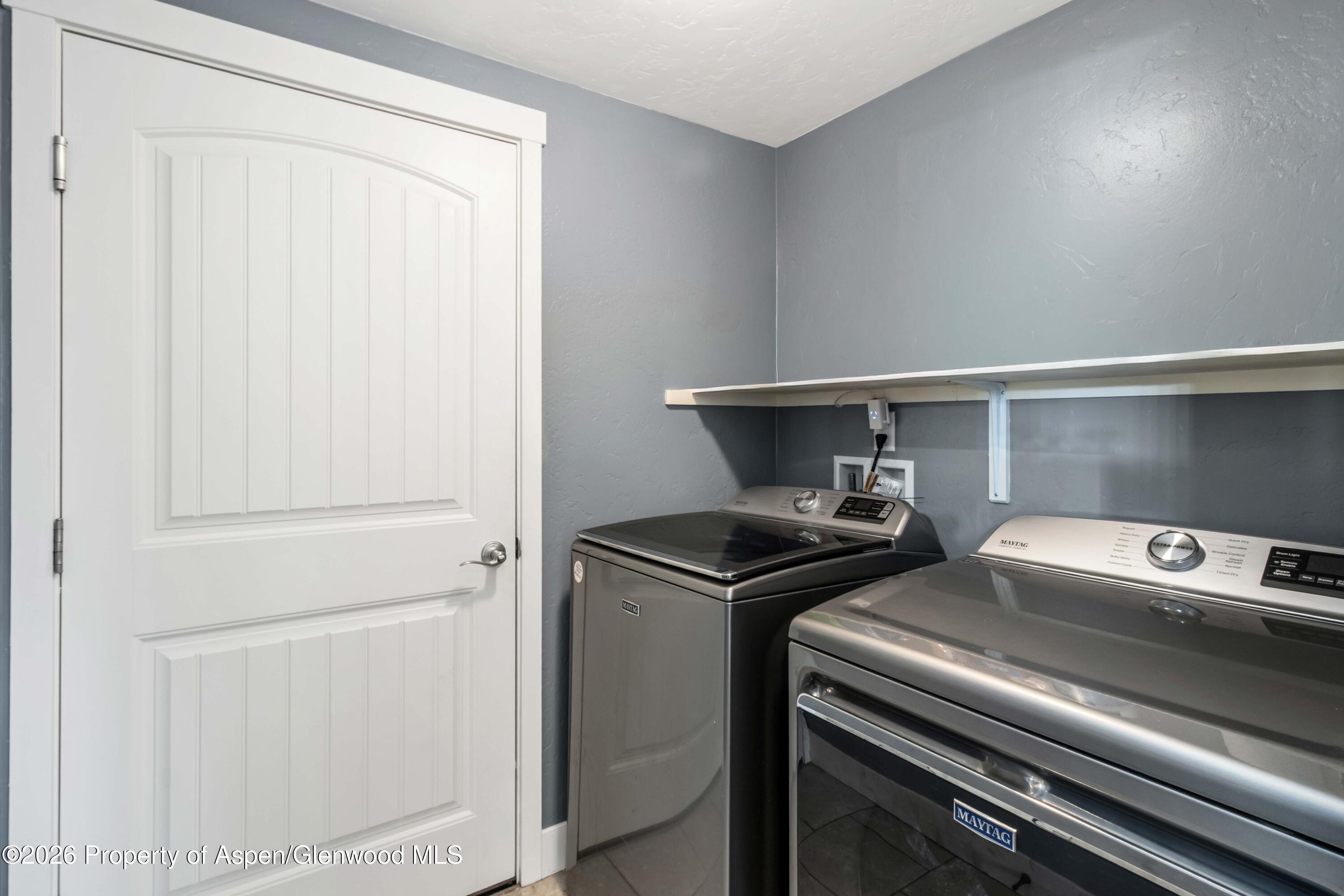 1671 East 17th Circle Rifle, CO 81650 - Photo 8 of 25 a view of washer and dryer