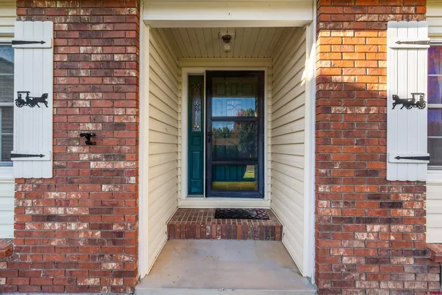 a front view of a house with a door