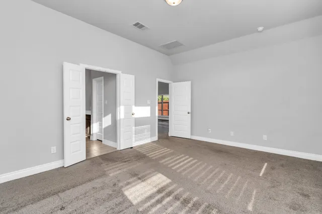 a bathroom with a bathtub and a sink