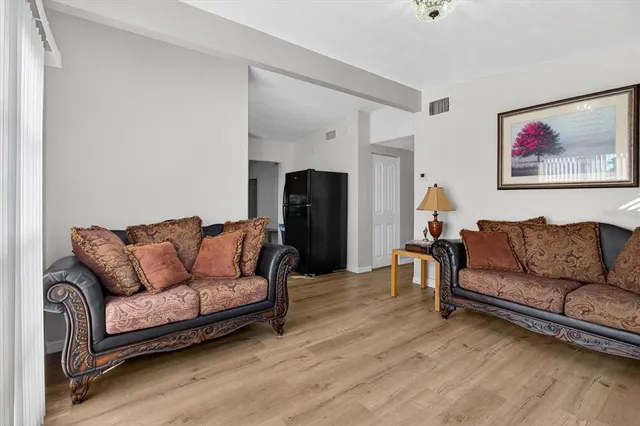 a living room with furniture and a couch