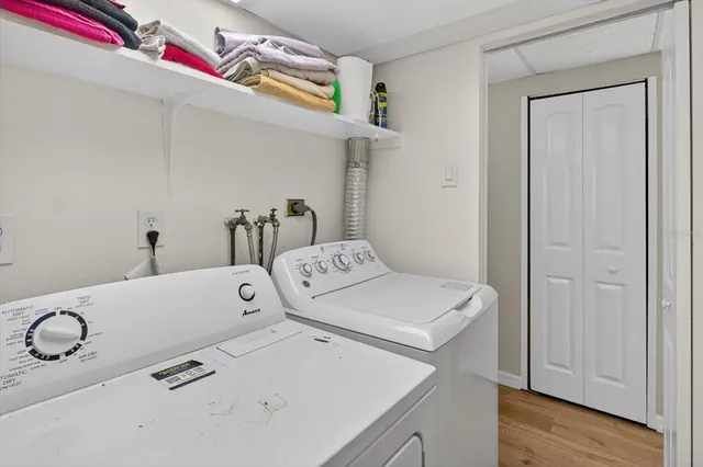 a utility room with dryer and washer