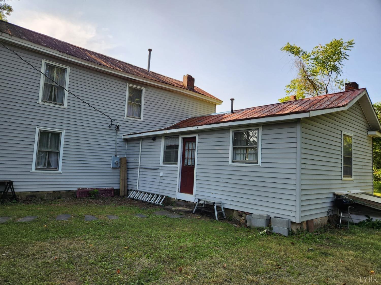 170 Taro Road Cullen, VA 23934 - Photo 3 of 22 a view of a house with a backyard