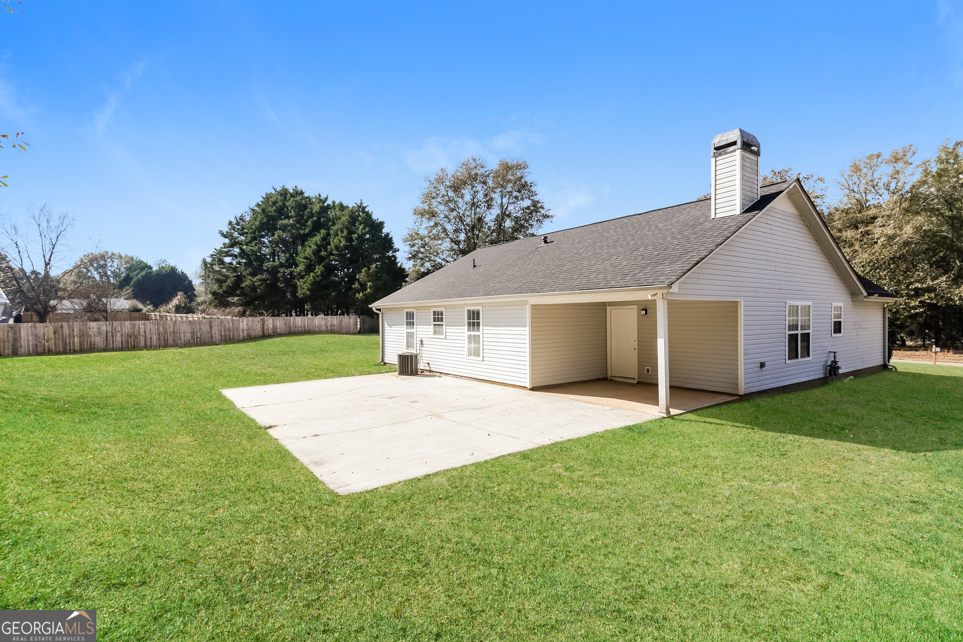 3006 Ryan Road Locust Grove, GA 30248 - Photo 19 of 21 a view of a yard in front of a house with entertaining space