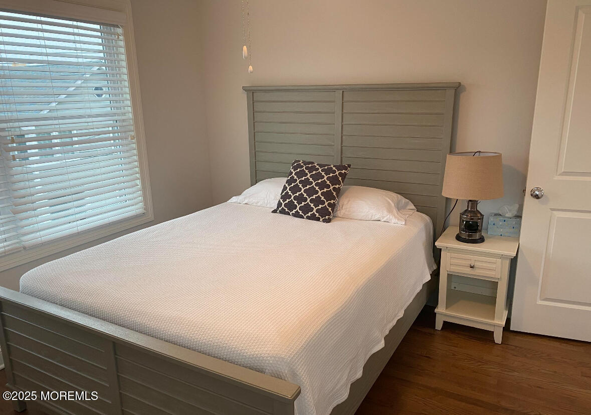 17 Via Ripa Way Sea Bright, NJ 07760 - Photo 13 of 31 a bedroom with a bed and a night stand