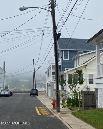 a view of a street with cars