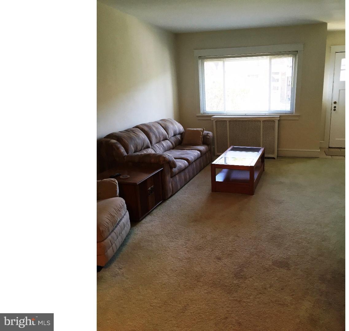 294 Sanford Road Upper Darby, PA 19082 - Photo 2 of 20 a living room with furniture and a window