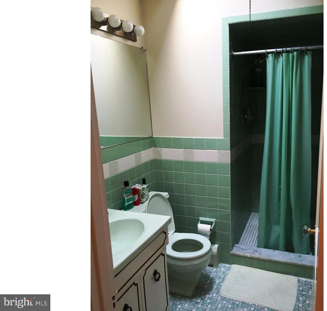 294 Sanford Road Upper Darby, PA 19082 - Photo 12 of 20 a bathroom with a sink and toilet