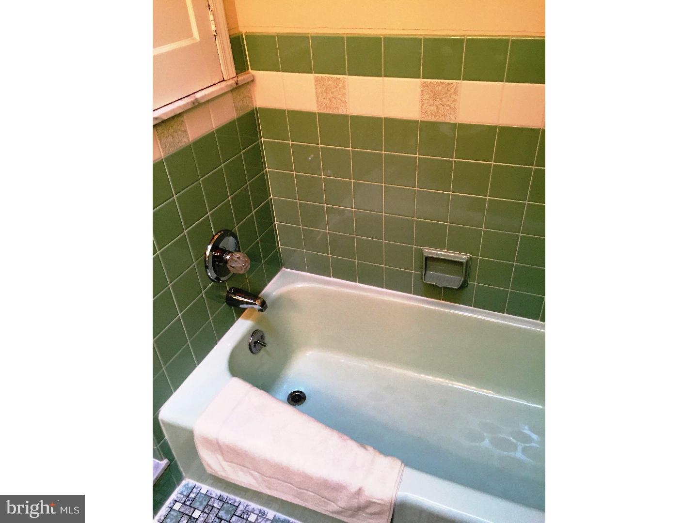 294 Sanford Road Upper Darby, PA 19082 - Photo 13 of 20 a bathroom with a bathtub and shower