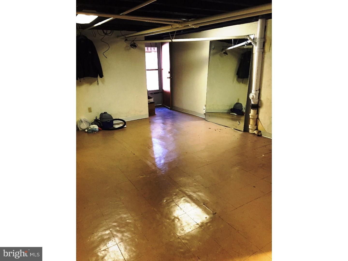 294 Sanford Road Upper Darby, PA 19082 - Photo 15 of 20 a view of a room with gym equipment and a window