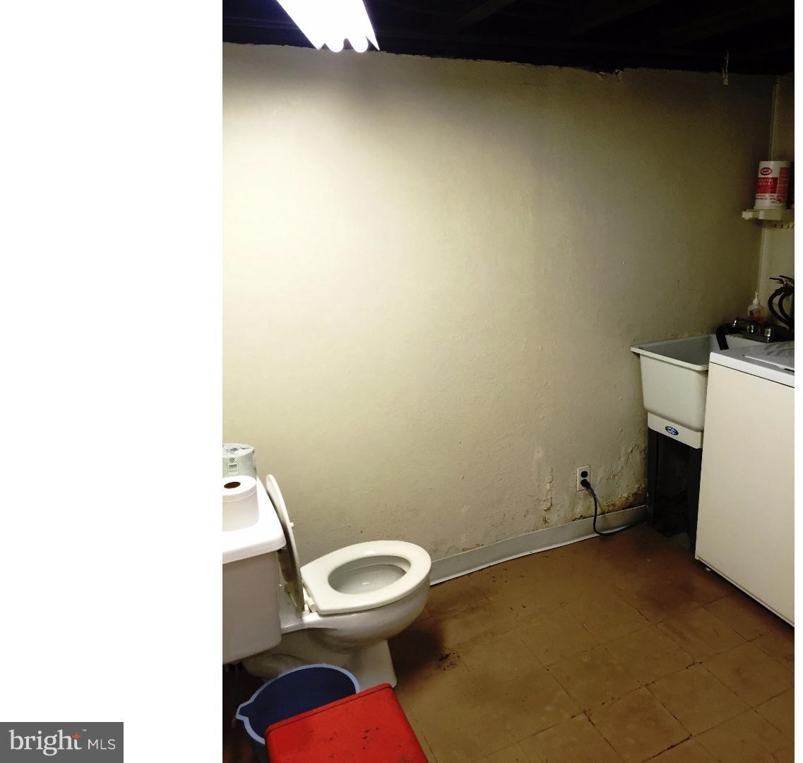 294 Sanford Road Upper Darby, PA 19082 - Photo 17 of 20 a bathroom with a toilet and a sink