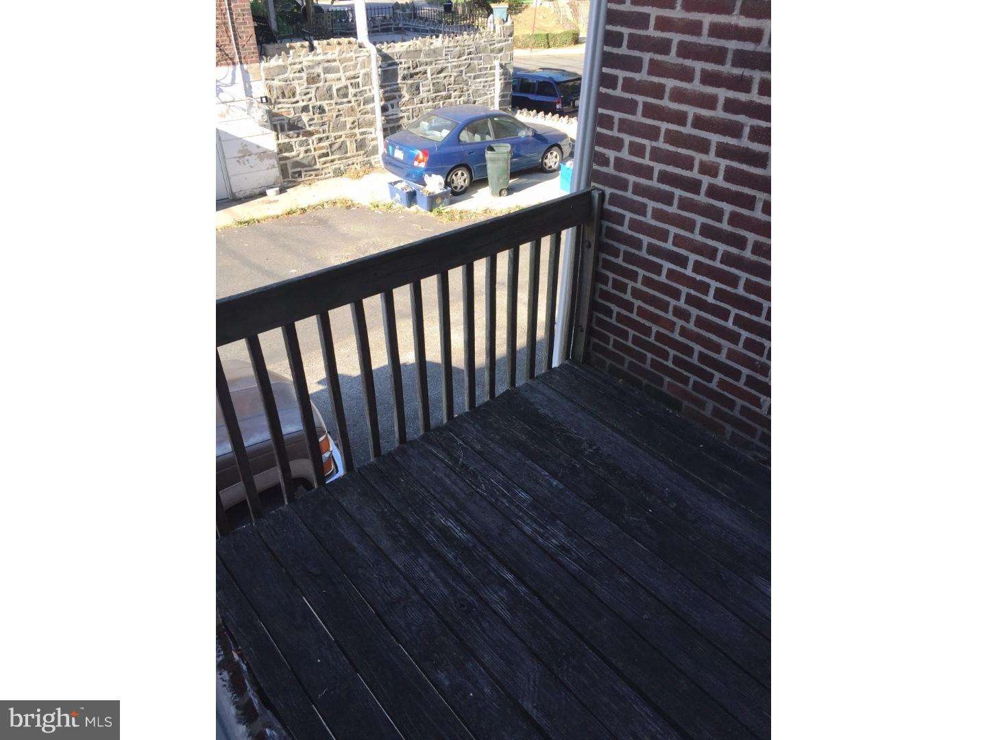 294 Sanford Road Upper Darby, PA 19082 - Photo 20 of 20 a view of a balcony with wooden floor