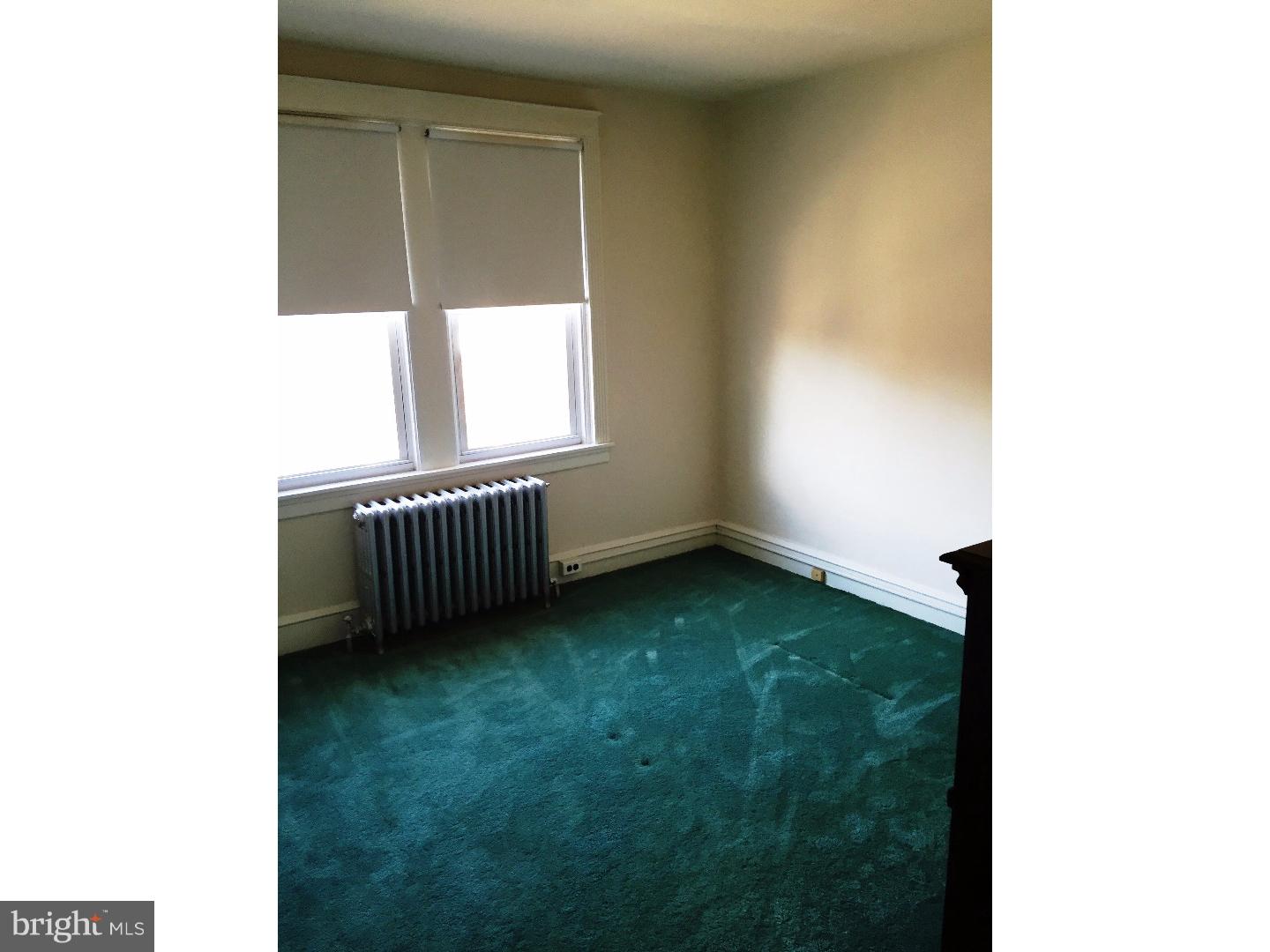 294 Sanford Road Upper Darby, PA 19082 - Photo 9 of 20 a view of a room with a window and a yard